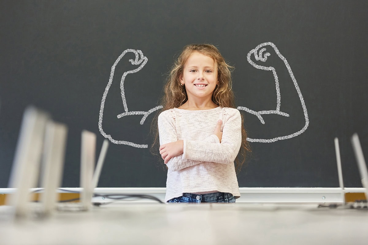 Girl,In,School,Is,Standing,In,Front,Of,Blackboard